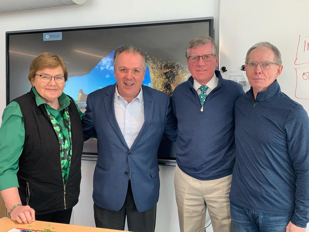 March 16, Teacher Maire Concannon, with Aidan Hume,Tom Beatty and Paul Moran who visited Irish language class at Catholic Memorial . Aidan Hume spoke to students of his late father, Nobel Peace Laureate, John Hume.